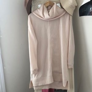 Long cream sweater